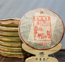 2011 Yiwu Routou Yiwurou spring fermented tmavý puerh koláč 357g